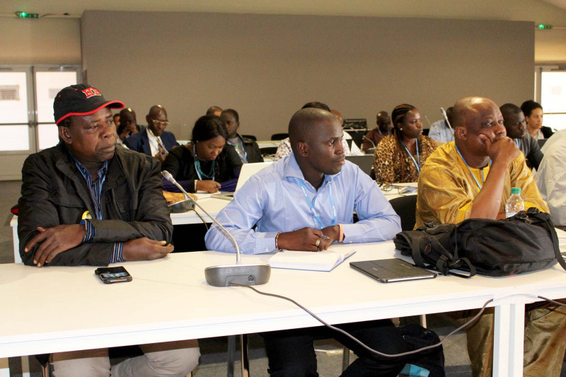 Ismaila Senghore (left) at a briefing by the Gambian delegation at COP22
