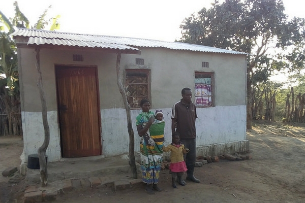 Aaron and Mavis Mumba outside home